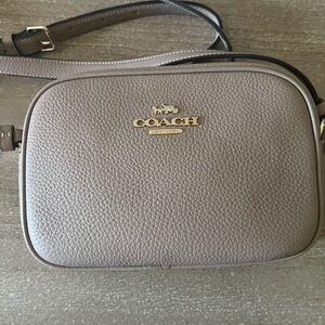 Coach Tan Crossbody Bag with Pebbled Leather and Minimalist Design